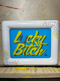 "Lucky Bitch" Hand-Painted Framed Glass Sign